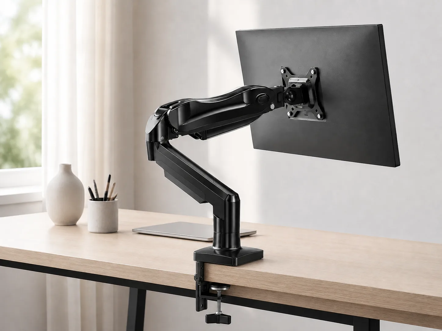 Rear three-quarter view of the single monitor arm