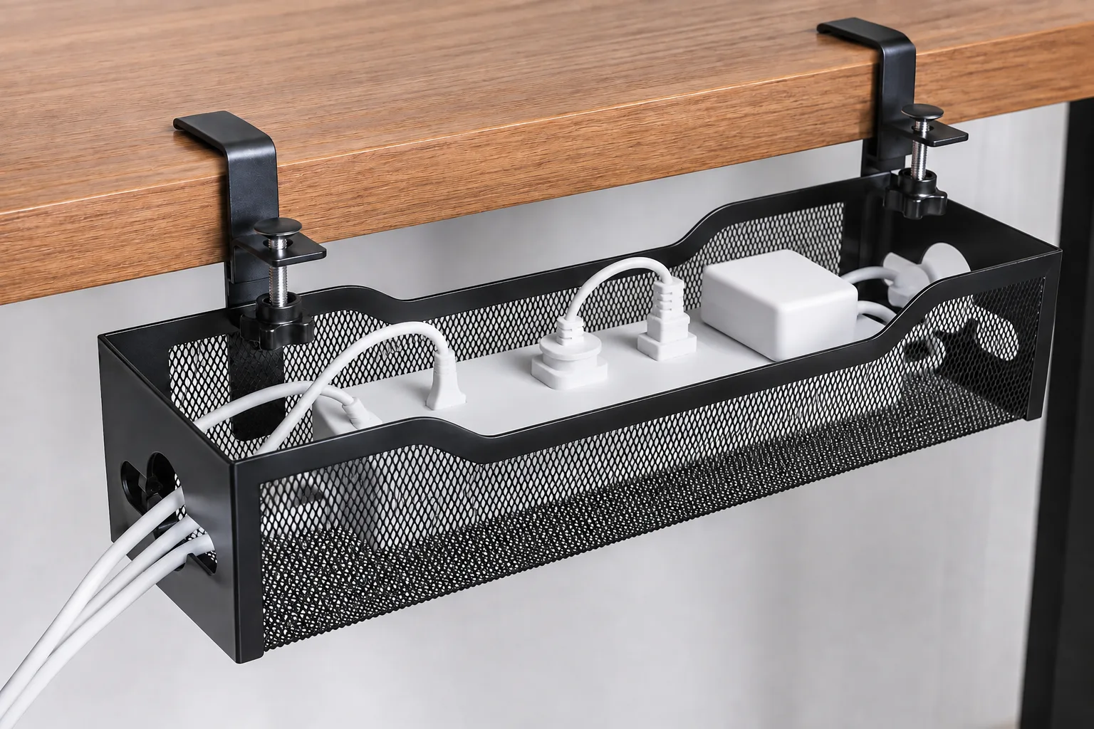 Open basket holding an unmarked power strip and adapters