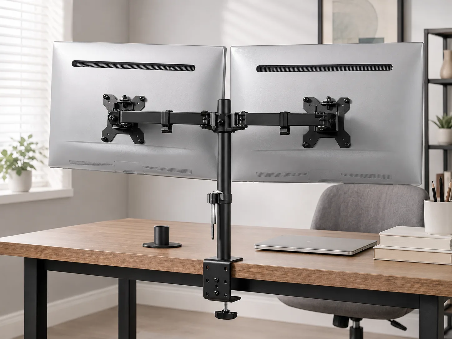 Rear view of the pole and two articulated monitor arms