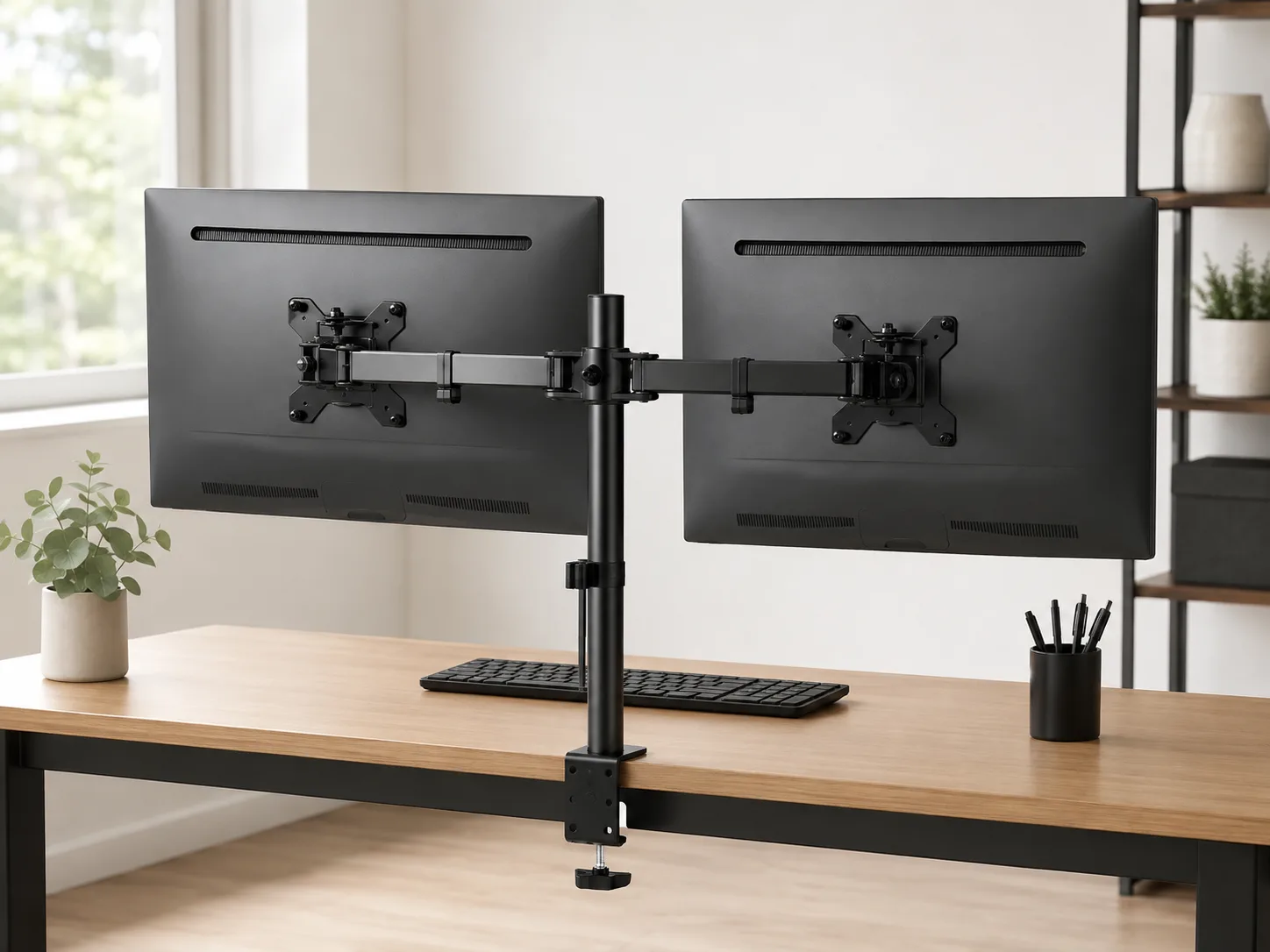 Two elevated screens above a clear desktop